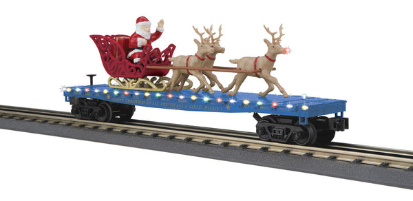 30-76945 - O Gauge RailKing North Pole Flat Car w/LED Lights, Santa Sleigh & Reindeer
