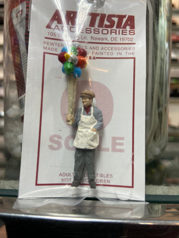 a1630 - Balloon Vendor Holding Balloons
