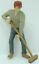 a1170 - Man Pushing Broom